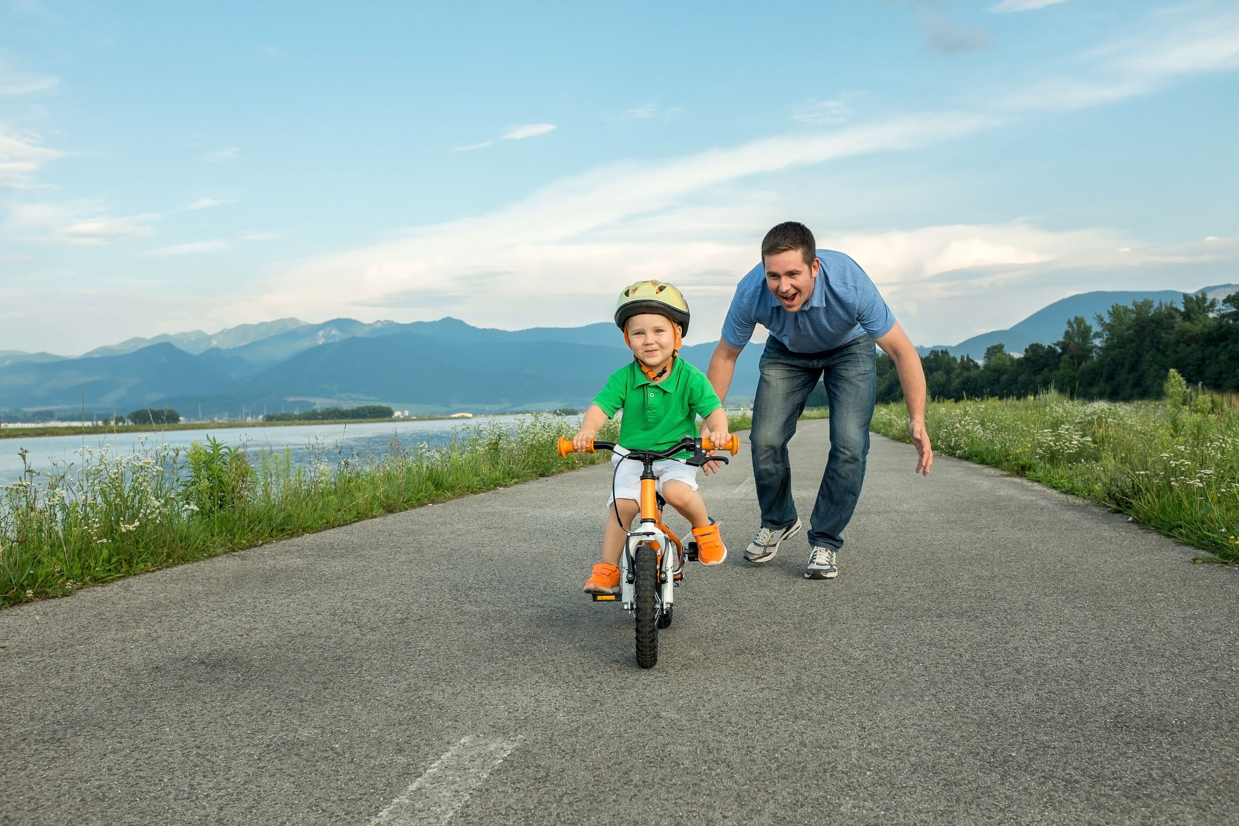 37279314 - happiness father and son on the bicycle outdoor